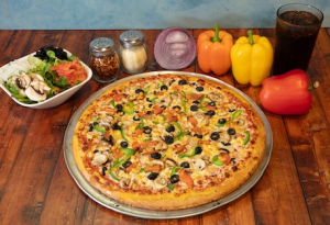 image004 Genos Giant Slice pizza with vegetables and cheese on wooden table, accompanied by salad, peppers, and drink