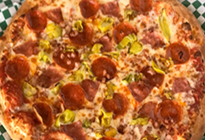 image012 Genos Giant Slice pizza topped with pepperoni, green peppers, and cheese on a checkered surface